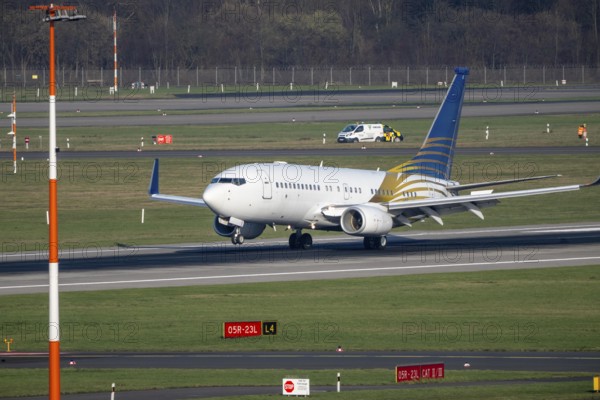 Landing of the Boeing 737-700 BBJ, Royal Jet, airline from the United Arab Emirates based in Abu Dhabi, luxurious charter plane commuting between the UAE and Europe, Düsseldorf Airport, DUS