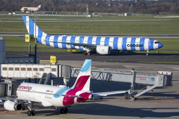 Eurowings Airbus aircraft, Condor Airbus A330-900, on the way to takeoff, at Terminal A and at takeoff, Düsseldorf Airport, DUS
