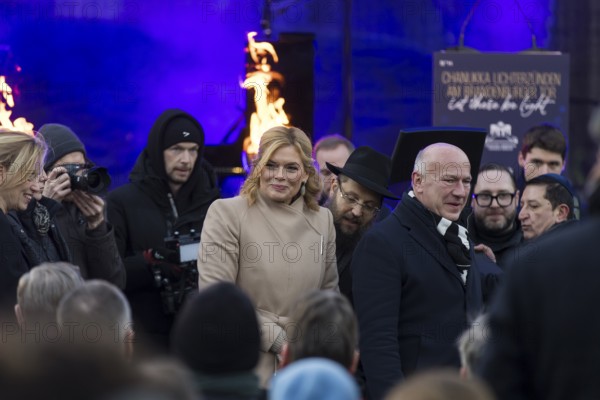 Julia Klöckner (President of the German Bundestag) and Kai Wegner (Governing Mayor of Berlin) at the arrival for the lighting of lights to mark 20 years of Hanukkah in front of the Brandenburg Tor tor, Berlin, 17 December 2025