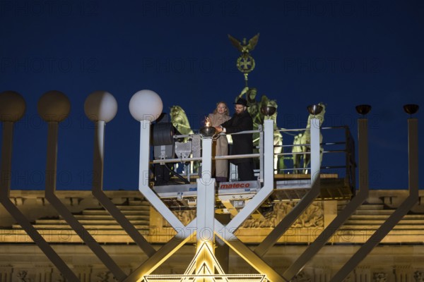 Julia Klöckner (President of the German Bundestag) and Rabbi Yehuda Teichtal (Rabbi of the Chabad-Lubavitch movement) at the lighting of lights to mark 20 years of Hanukkah in front of the Brandenburg Tor, Berlin, 17 December 2025