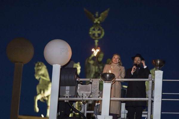 Julia Klöckner (President of the German Bundestag) at the lighting of lights to mark 20 years of Hanukkah in front of the Brandenburg Tor tor, Berlin, 17 December 2025