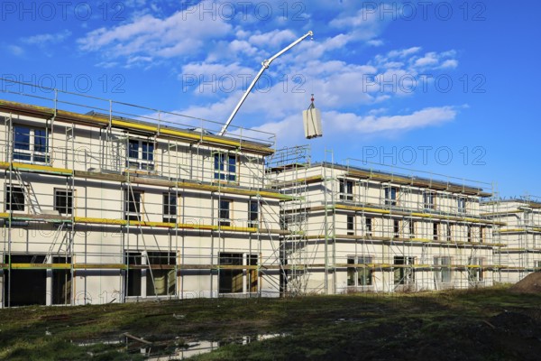 Castrop-Rauxel, North Rhine-Westphalia, Germany - residential construction in the Ruhr area. New construction district with semi-detached and terraced houses in the energy-saving KfW efficiency house standard 55