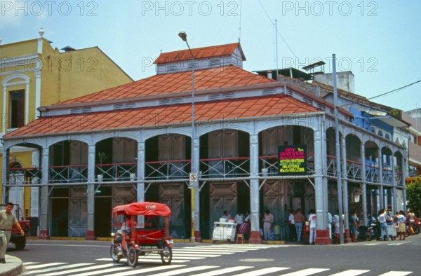 Tuk-tuk, iron house built by Gustav Eiffel in the center of Iquitos on the Amazon, Peru, South America, September 1997, vintage, retro, old, historic
