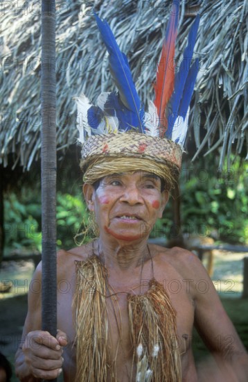Chief of a Yagua tribe near Iquitos on the Amazon poses for photos, Peru, South America, September 1997, vintage, retro, old, historic