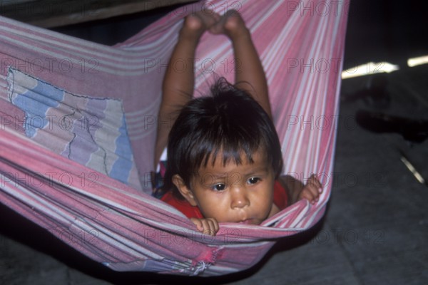 Little child in hammock, village of Pantoja near Iquitos, Peru, South America, September 1997, vintage, retro, old, historic