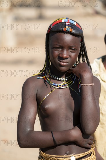 Portrait, brightly decorated girl of the Hakaona tribe, also Havakona or Hakawona, near Opuwo, Kunene, Namibia