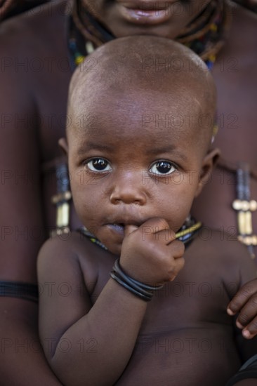 Himba Baby, traditional Himba village, Kaokoveld, Kunene, Namibia