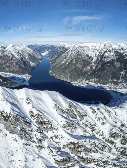 Aerial view, epic view of mountain landscape with snow in winter, summit of Bärenkopf, Achensee, Tyrol, Austria