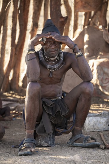 Elderly man, leader of the Himba, traditional Himba village, Kaokoveld, Kunene, Namibia