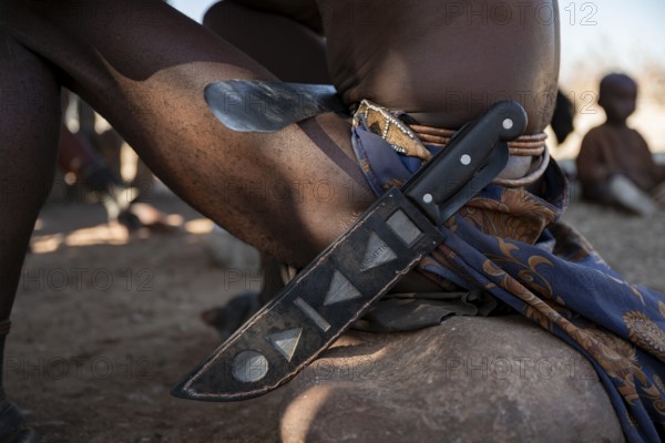 Detail, machete on a Himba belt, traditional Himba village, Kaokoveld, Kunene, Namibia