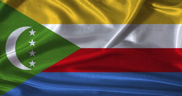 National flag of Comoros with cloth texture. Comoros flag with realistic texture background