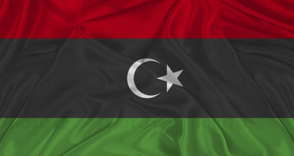 Libyan flag with fabric texture. Realistic flag of Libya waving, National flag