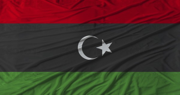 Libyan flag waving. Flag of Libya with cloth texture