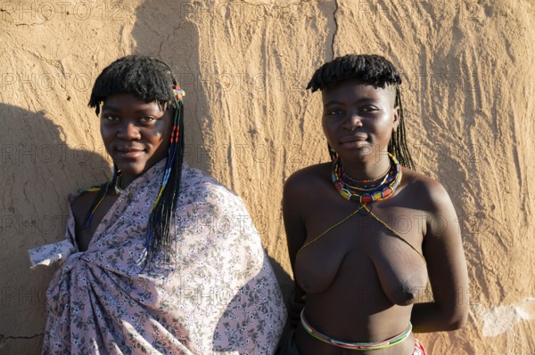 Portrait, brightly decorated woman of the Hakaona tribe, also Havakona or Hakawona, near Opuwo, Kunene, Namibia