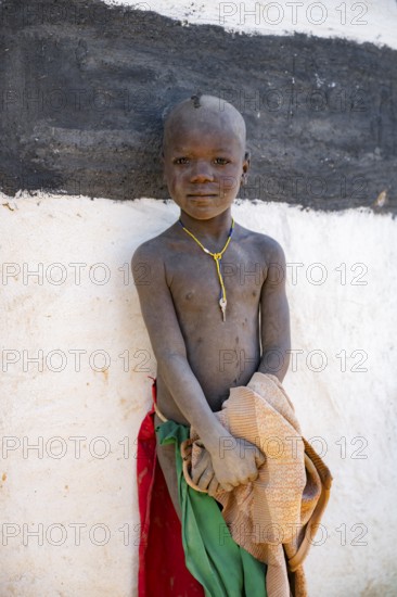 Portrait, child of the Hakaona tribe, also Havakona or Hakawona, near Opuwo, Kunene, NamibiaPortrait, colourfully decorated woman of the Hakaona tribe, also Havakona or Hakawona, near Opuwo, Kunene, Namibia