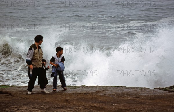 Father and son on the shore, surf, Salto del Fraile, Costa Verde, Lima, Peru, September 1997, vintage, retro, old, historic