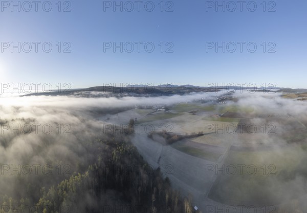 Aerial view of fog over fields and forest, St.Veit, Berndorf, Lower Austria, Austria