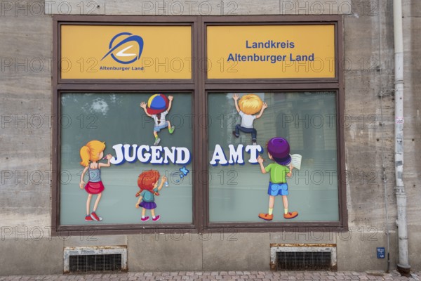 Colourful illustrations of children playing, Youth Welfare Office, Altenburg, Thuringia