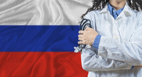 Healthcare professional with Russia flag background. Professional doctor holding stethoscope on Russia flag background
