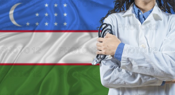 Healthcare professional with Uzbekistan flag background. Professional doctor holding stethoscope on Uzbekistan flag background