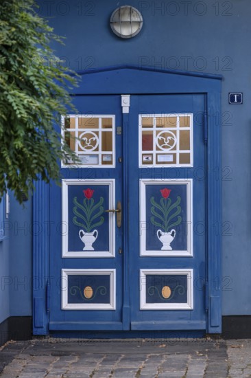 Decoratively designed front door of a residential building, Ahrenshoop, Darß, Mecklenburg-Western Pomerania, Germany