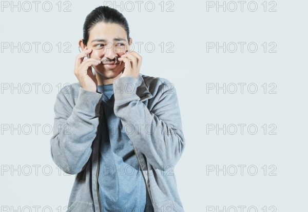 Guy with disgusted face looking to the side isolated. Person with embarrassed face looking to the side isolated