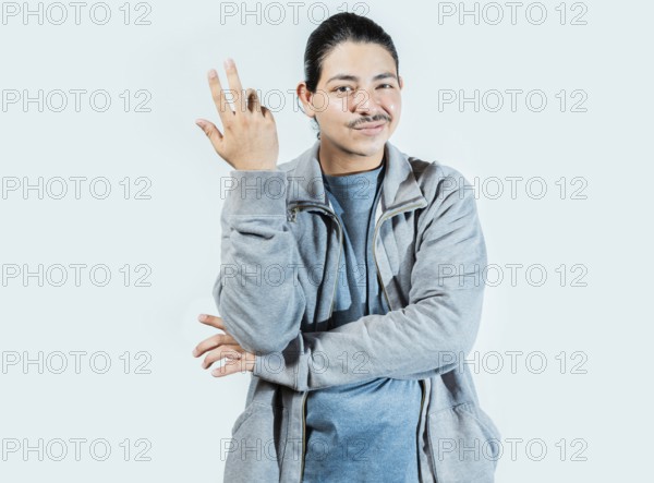 Indifferent man gesturing with hand isolated. Guy with puzzled face frowning isolated
