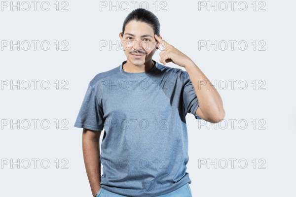 Pensive asian man with doubtful expression isolated. Thoughtful guy looking at camera isolated