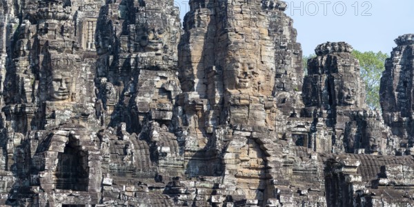 Panoramic picture of huge stone-carved faces of Bodhisattva Lokeshvara, also Avalokiteshvara, Bayon Temple, Angkor Thom, UNESCO World Heritage Site, Angkor Wat, Siem Reap, Cambodia