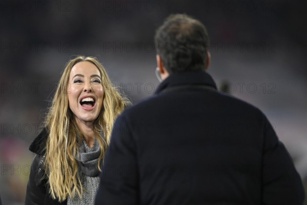 DAZN presenter reporter Sylvia Walker talking with TV expert Michael Ballack, laughs, Allianz Arena, Munich, Bavaria, Germany