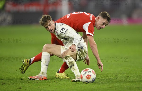 Duel, dogged action, Nikolas Veratschnig 1. FSV Mainz 05 (22) against Joshua Kimmich FC Bayern Muenchen FCB (06) Allianz Arena, Munich, Bavaria, Germany
