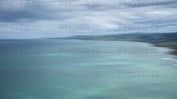 Wairarapa coast, sea, mountains, blurred, long exposure, ICM. Castlepoint, Wairarapa Coast, Wellington Region, North Island, New Zealand