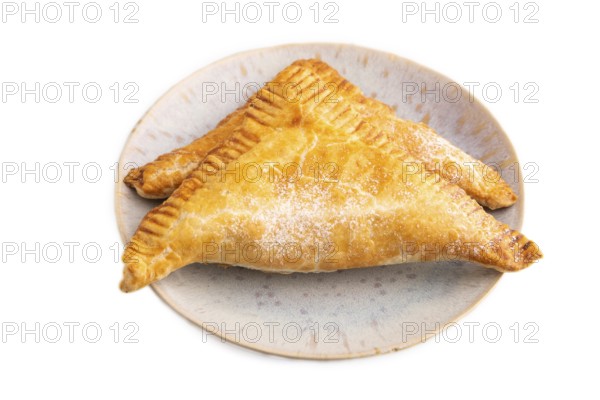 Triangles Pie, Puff Pastry, Samsa with cherry jam isolated on white background, side view, close up