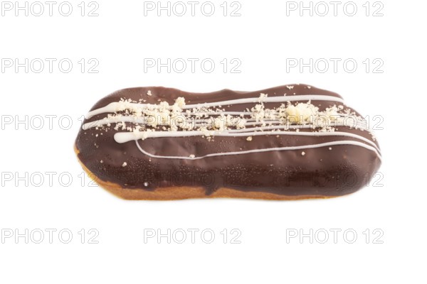 Glazed Chocolate Eclair on brown concrete isolated on white, side view, close up