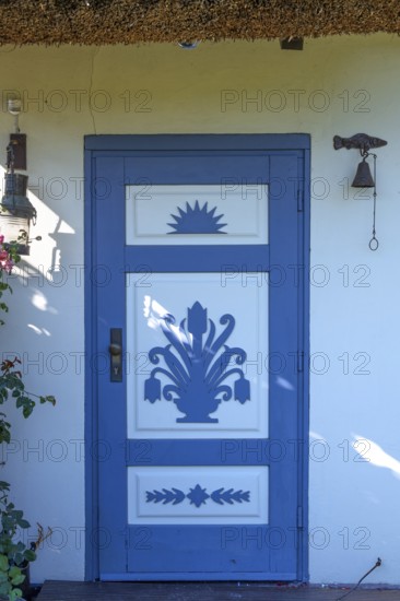 Decoratively designed front door on a residential building, Ahrenshoop, Darß, Mecklenburg-Western Pomerania, Germany