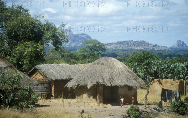 Thatched huts in a village in Zambia, Africa, June 2000, vintage, retro, old, historic