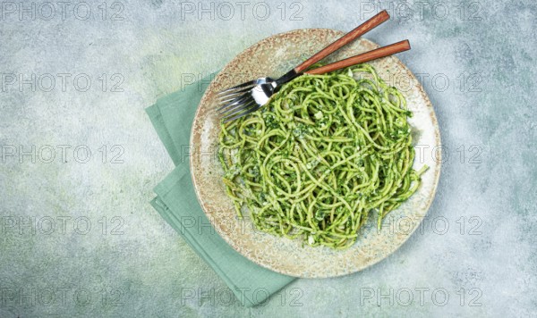 Spaghetti with pesto sauce, homemade, no people