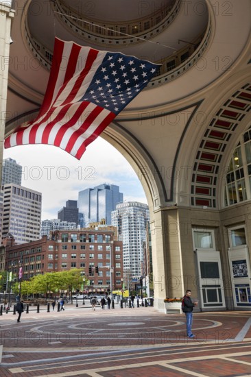 American flag fluttering, distinctive archway, Boston Harbor Hotel, Rowes Wharf, passers-by, Freedom Trail, Financial District, Downtown, Boston, Massachusetts, New England, USA