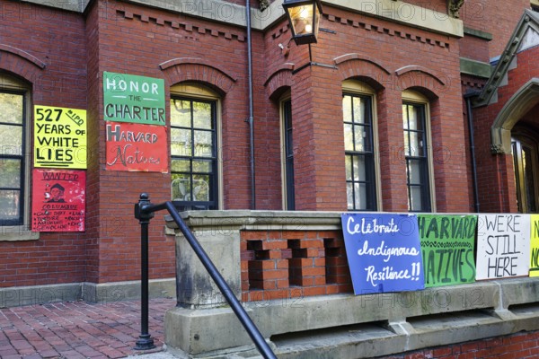 Posters, protest action, Indigenous Peoples' Day in October, history and culture, indigenous rights, Remembrance Day, Columbus Day, Harvard University, Cambridge, Greater Boston, Massachusetts, New England, USA
