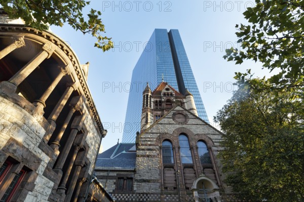 Trinity Church in front of glass façade, John Hancock Tower, various architectural styles on Copley Square, historic Back Bay district, Boston, Massachusetts, New England, USA