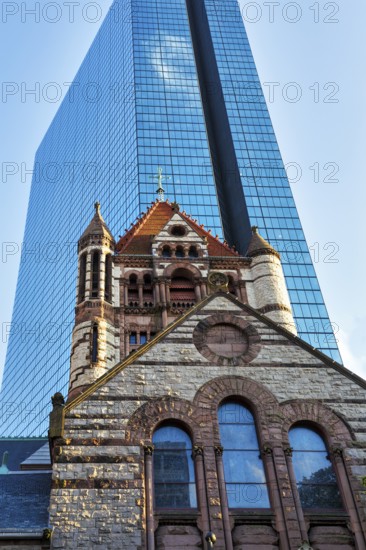 Trinity Church in front of glass façade, John Hancock Tower, various architectural styles on Copley Square, historic Back Bay district, Boston, Massachusetts, New England, USA