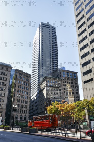 Boston Duck Tour, special city tour in amphibious vehicle from World War II, red bus in front of Old State House, passers-by, Indian Summer, Financial District, Downtown, Boston, Massachusetts, New England, USA