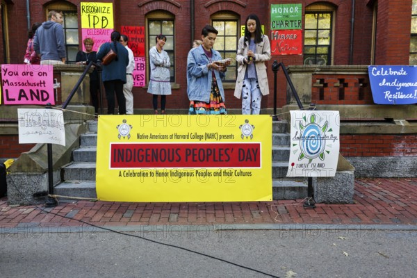 Posters, students at protest action, Indigenous Peoples' Day in October, history and culture, indigenous rights, Remembrance Day, Columbus Day, Harvard University, Cambridge, Greater Boston, Massachusetts, New England, USA