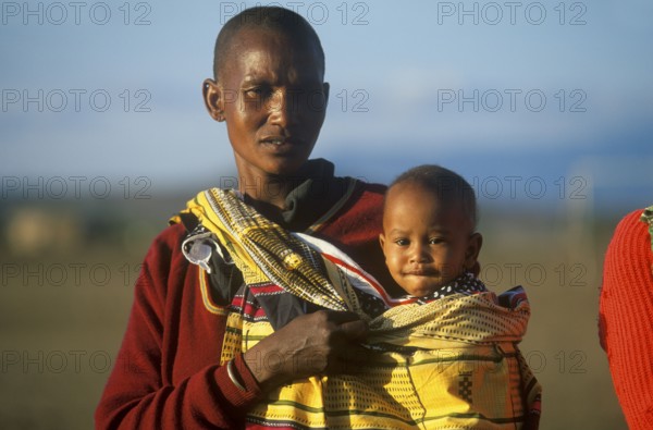 Maasai woman with baby, Arusha, Tanzania, Africa, June 2000, vintage, retro, old, historic
