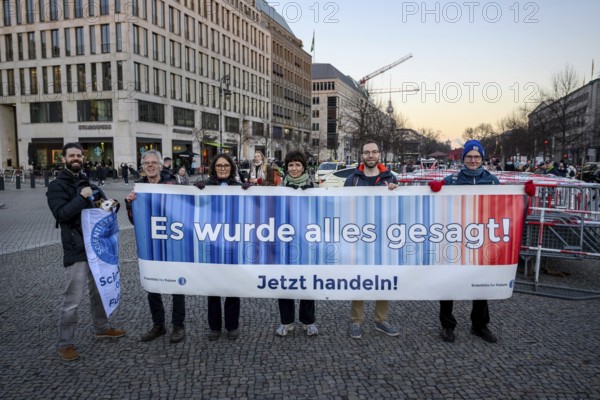 Banner It's all been said! Act now! by Scientists for Future at Fridays for Future rally on 10 years of Paris Agreement and 7 years of Fridays for Future. Pariser Platz, Berlin, 12.12.2025