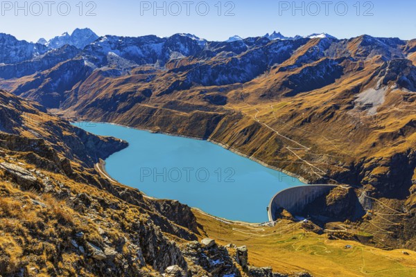 The dam and the turquoise Lac de Moiry reservoir, in the back the Pointe de Moiry mountains, Val d'Anniviers, Valais Alps, Canton of Valais, Switzerland