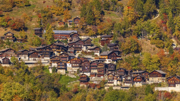 The mountain village of Pinsec with autumn colors, Val d'Anniviers, Valais Alps, Canton of Valais, Switzerland