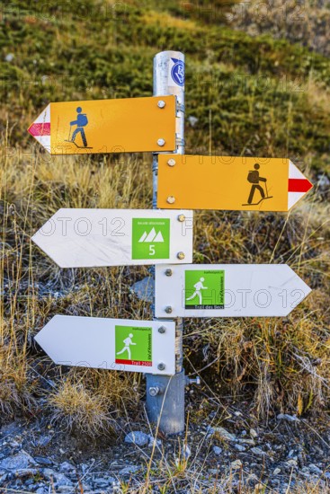 Information boards on trails for hikers and mountaineers near the Lac de Moiry reservoir, Val d'Anniviers, Valais Alps, Canton of Valais, Switzerland