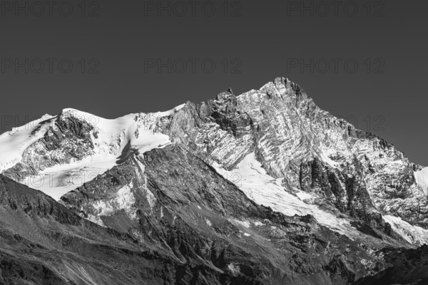 Snowy peak of Weisshorn mountain, black and white photo, Val d'Anniviers, Valais Alps, Canton of Valais, Switzerland