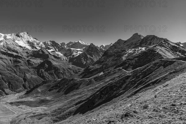 Snow-capped peaks in Val d'Anniviers, view from Corne de Sorebois mountain peak, black and white photo, Valais Alps, Canton of Valais, Switzerland